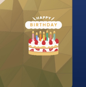 スマートフォンアプリ「ザ・フジタ・メンバーズ」の誕生日メッセージ画面のスクリーンショット。金色の幾何学模様の背景に、カラフルなろうそくが灯ったイチゴのデコレーションケーキのイラストと、「HAPPY BIRTHDAY」の文字がデザインされている。